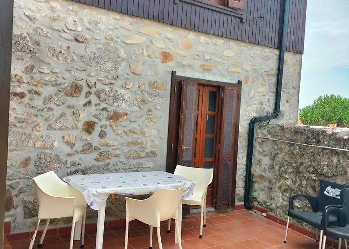Casa De Madeira E Pedra